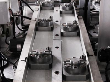 Sistema de montaje automatizado para piezas de arrancadores de automóviles