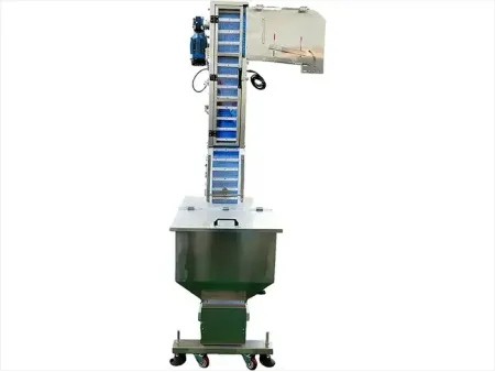 Elevador y alimentador de tapas automático