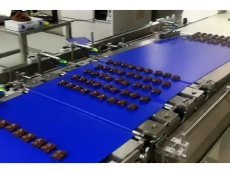 Sistema automático de envasado de obleas rellenas y chocolate